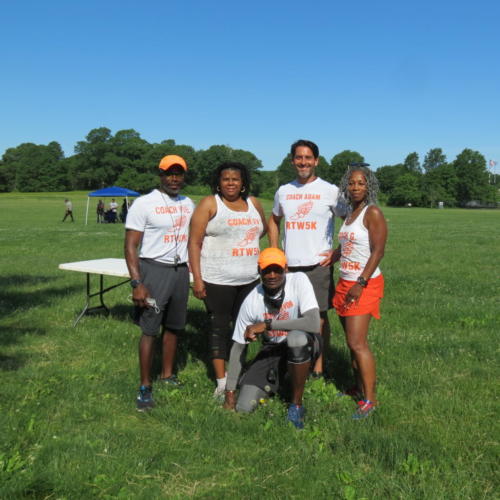 The Road to Wellness coaches pose in Franklin Park